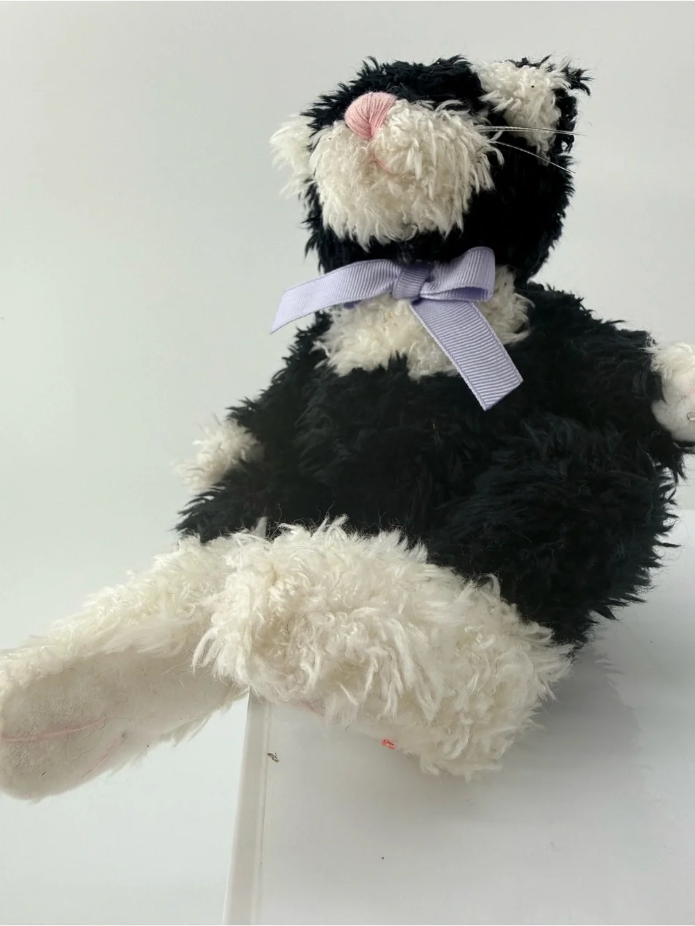 Plush Black & White Cat Toy with Lavender Bow - Soft Cuddly Pet Playmate
